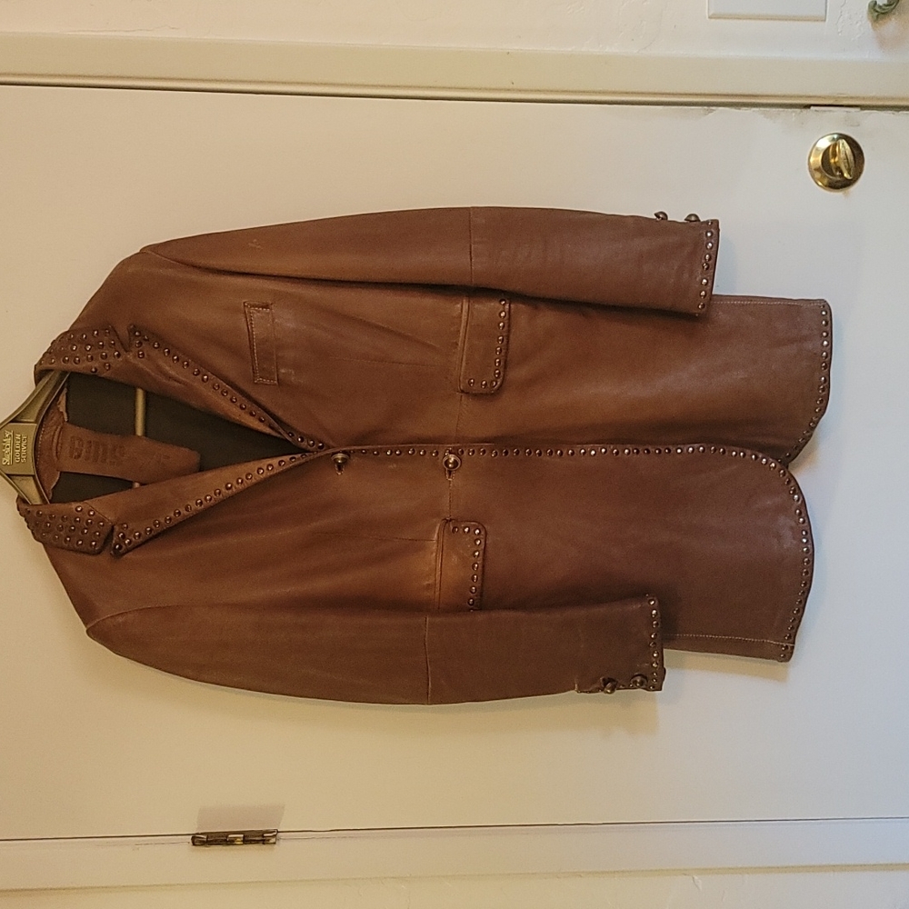 Leather jacket size small. Made by GMS - 75. $1200 originally. Lightly worn.
